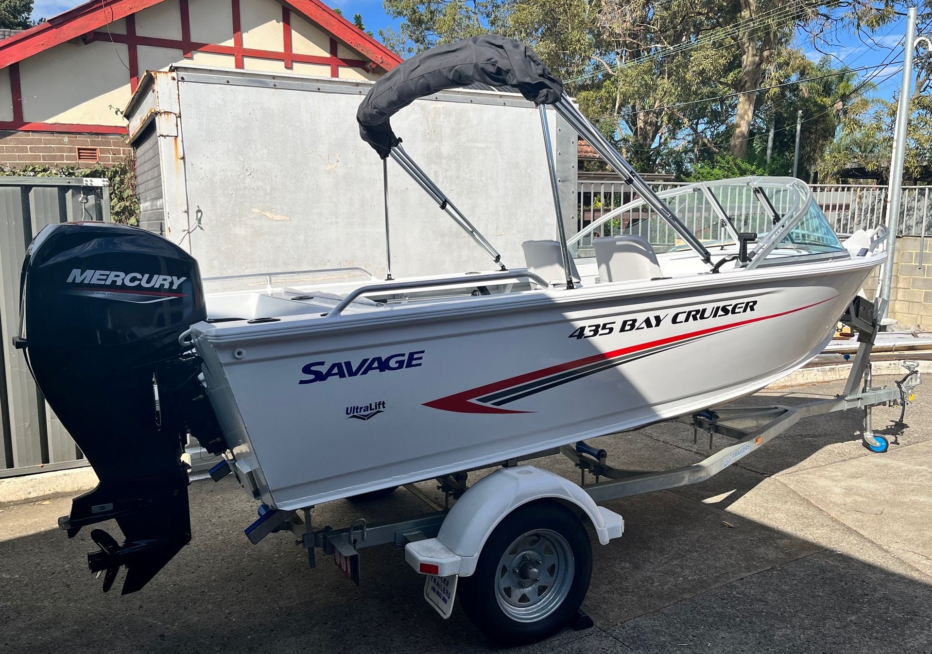Savage 435 Bay Cruiser package with Mercury 50hp and trailer (IN STOCK)