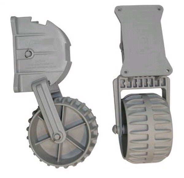 a pair of shoes are sitting in front of a suitcase